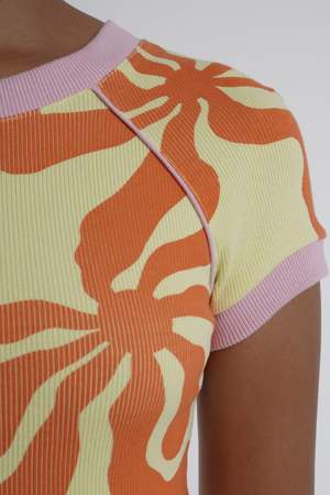 Arthur Apparel Hole Dress in Tequila Sunrise. Midi dress in yellow and orange for hire.