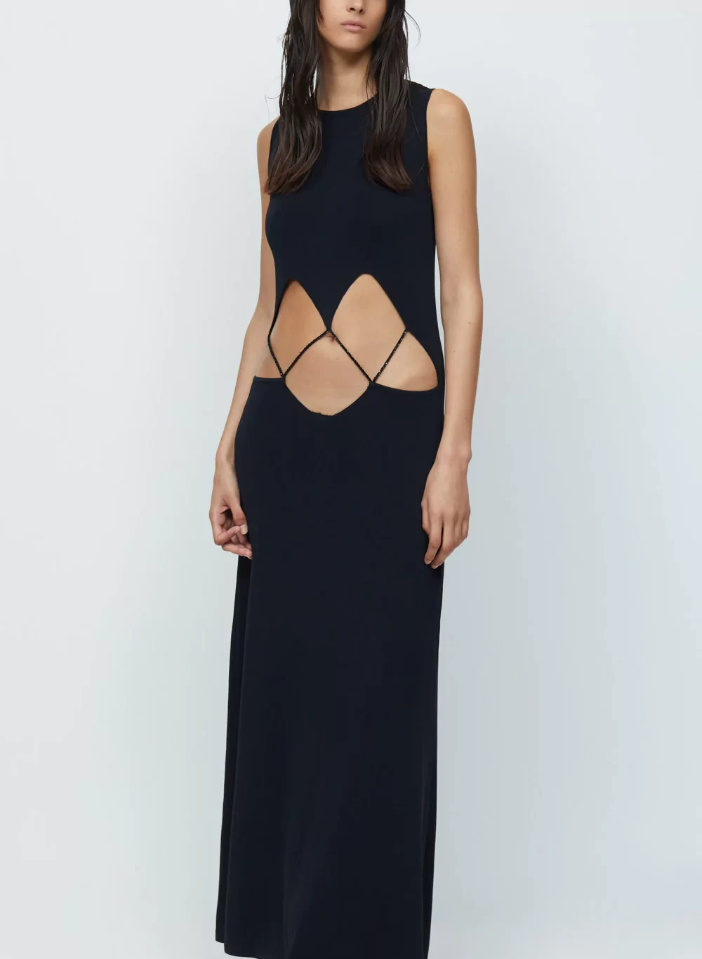 Bec and Bridge Skylar Suspend Knit Maxi Dress for rent. Black sleeveless maxi with front cut out.