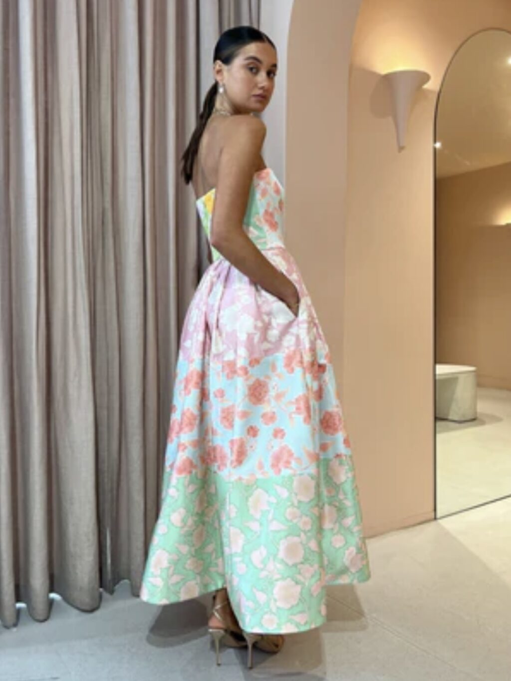 Leo Lin Anna Halterneck Maxi Dress for hire. A pastel pink floral halter maxi sundress.
